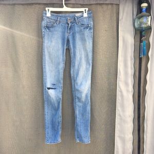 Blue distressed jeans